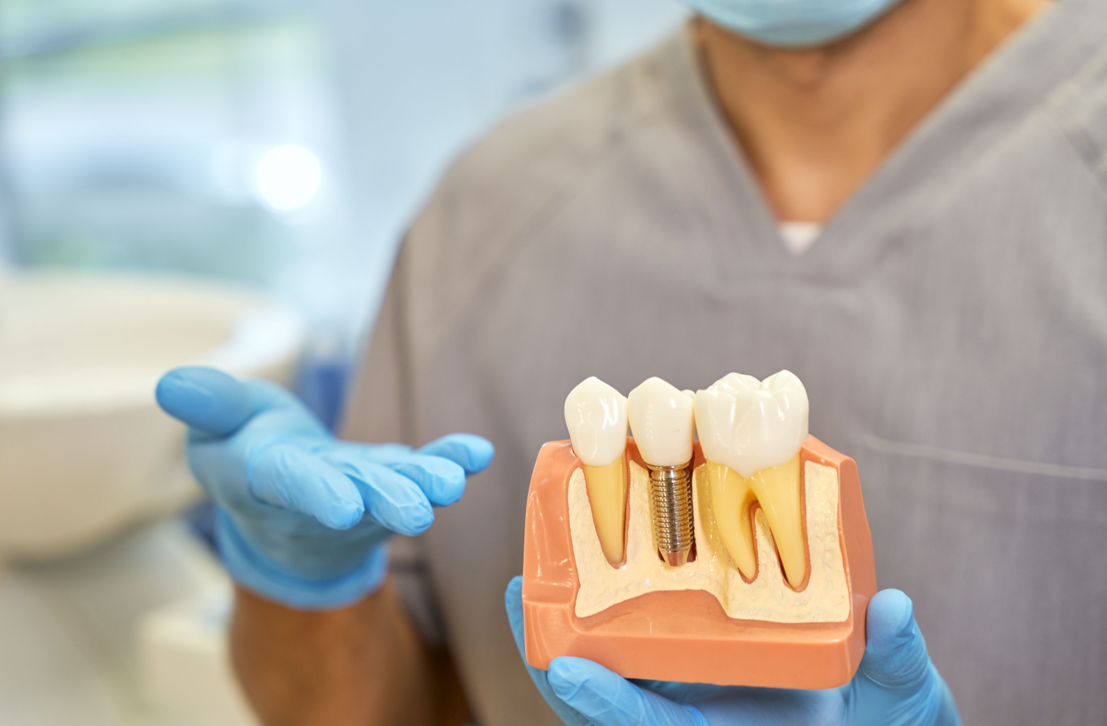 How To Get Dental Implants Covered by Insurance Hero