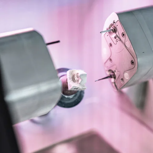 close up of dental milling machine crafting a custom crown at shin dentistry laboratory